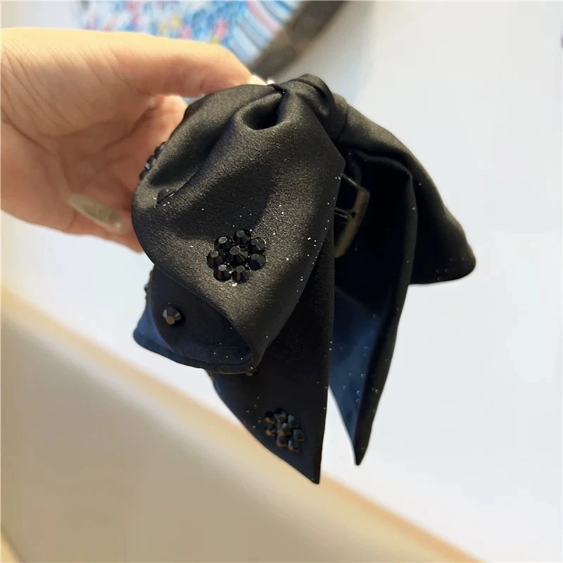 A高级感缎面气质花朵蝴蝶结后脑勺马尾抓夹年新款发夹1050