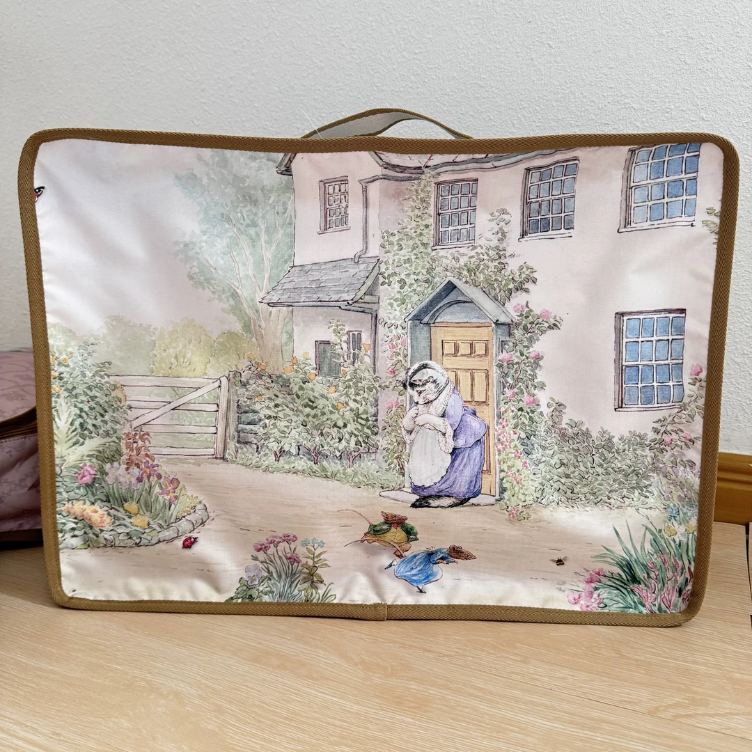 F104 新款比得兔手提包大容量整理一套三件衣袋彼得兔的故事