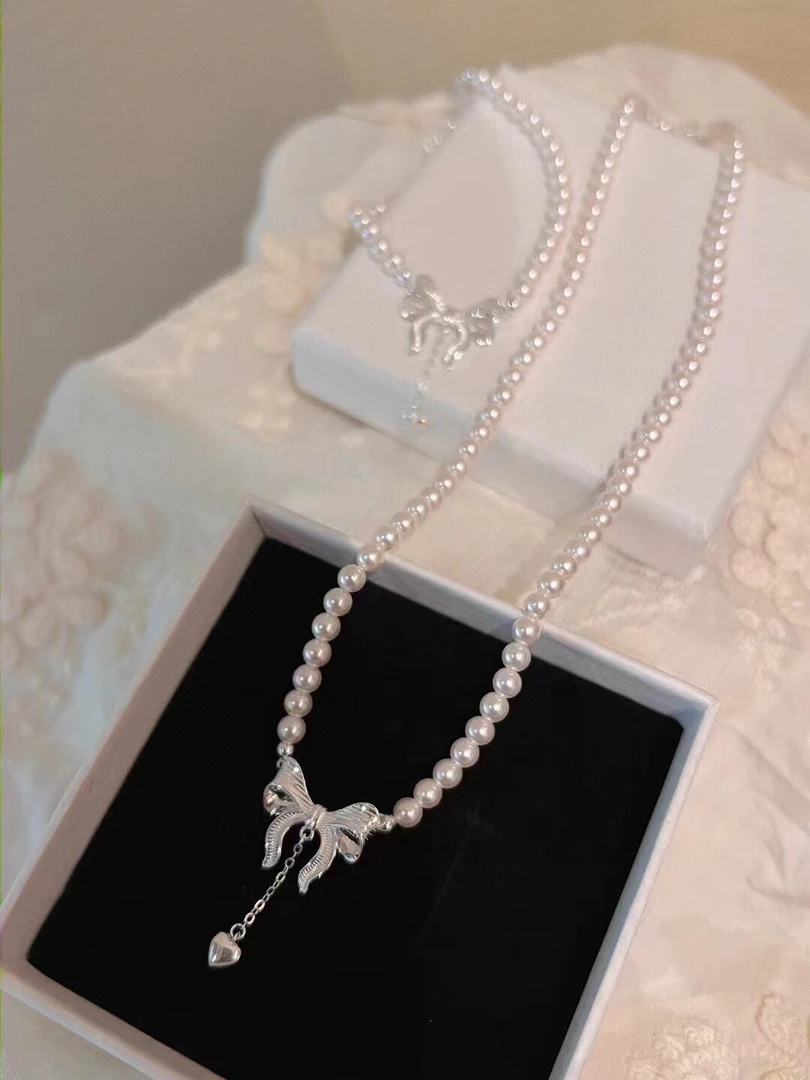 坠链均925银仿珍珠 925银套链 在逃公主蝴蝶结珍珠套链少女法式