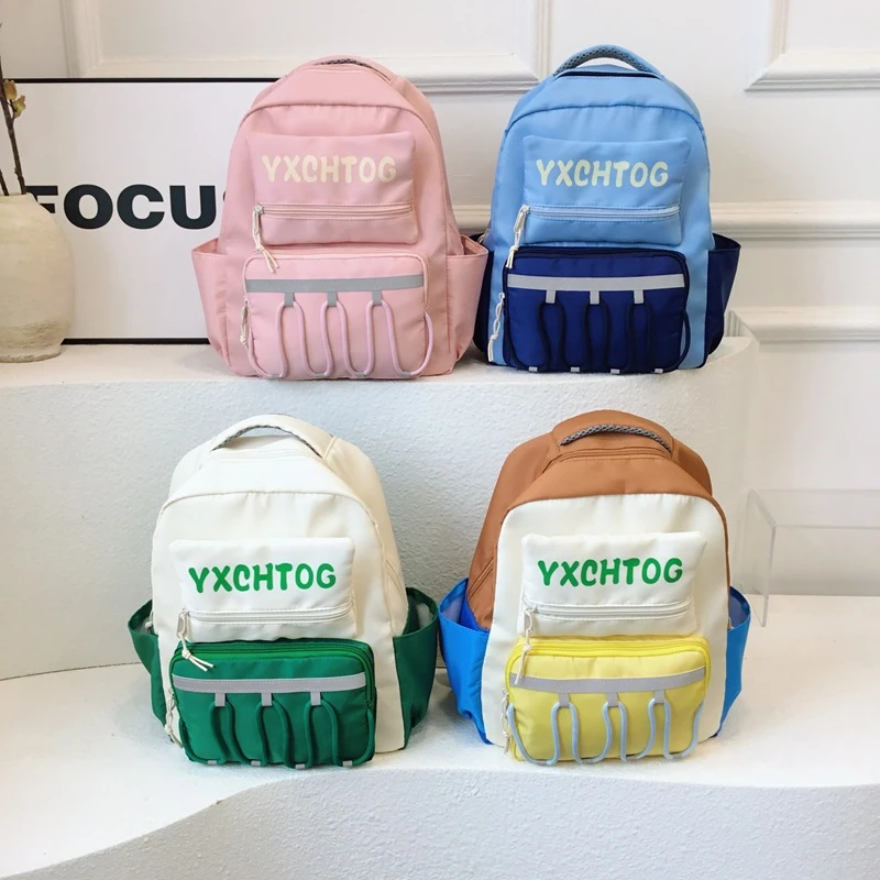 新款小学生书包洋气字母时尚撞色男女童双肩包2024大容量儿童背包