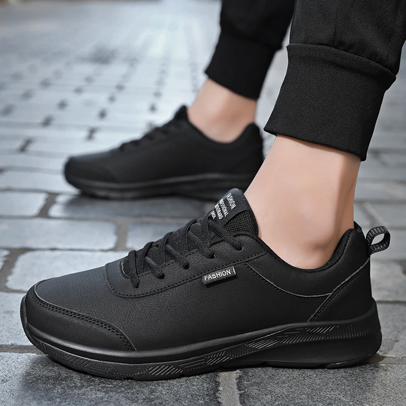 新款百搭运动休闲板鞋皮面减震跑鞋黑色防臭男士运动鞋上班工作鞋