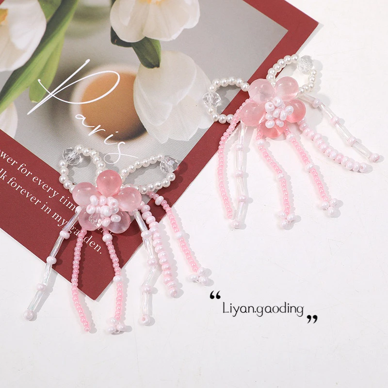 铜合金耳饰 桃余花朵～时尚长款轻奢个性修饰脸型大方耳环A040