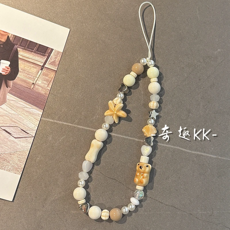 原创自制海星陶瓷小狗串珠手机链ccd相机挂件便携防丢手机壳挂绳