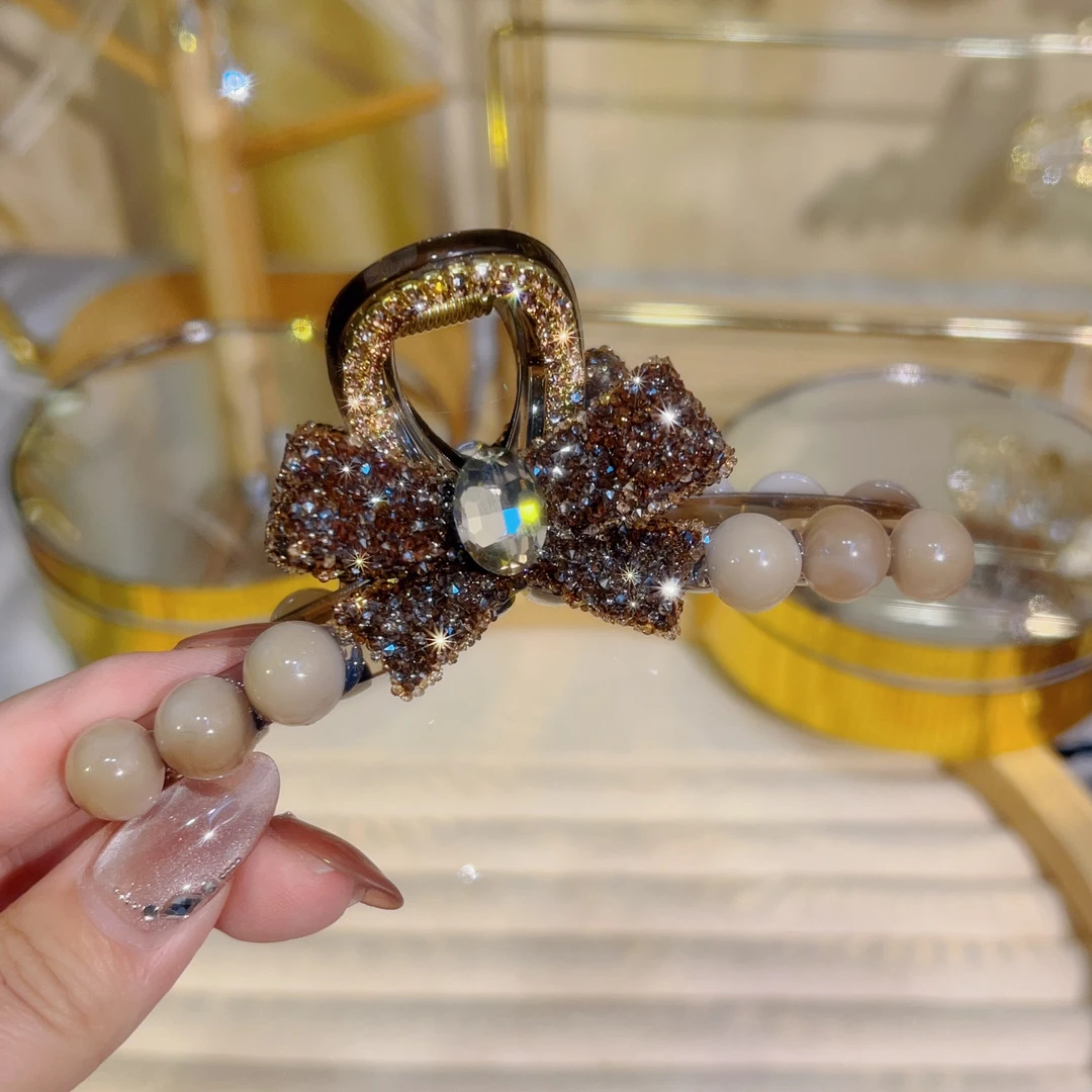 新款蝴蝶结猫眼珠大抓夹气质轻奢时尚重工韩版满钻