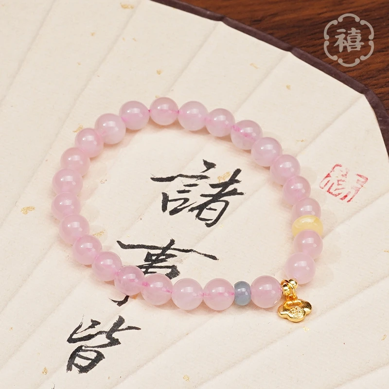 天然马粉水晶手串搭配福如意小锁吊坠手链多样性发颜色微差
