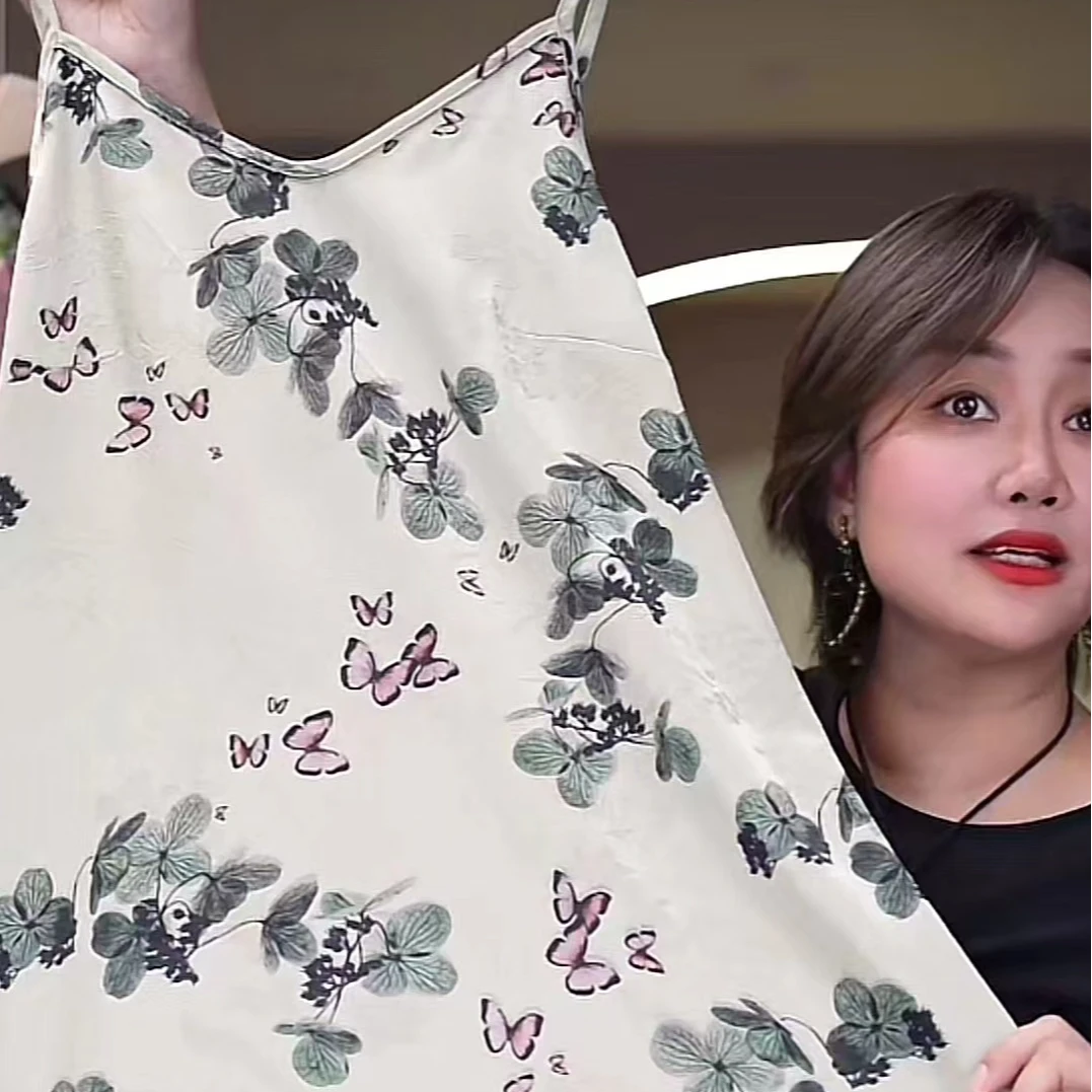 T1126时尚气质优雅吊带杏色蝴蝶