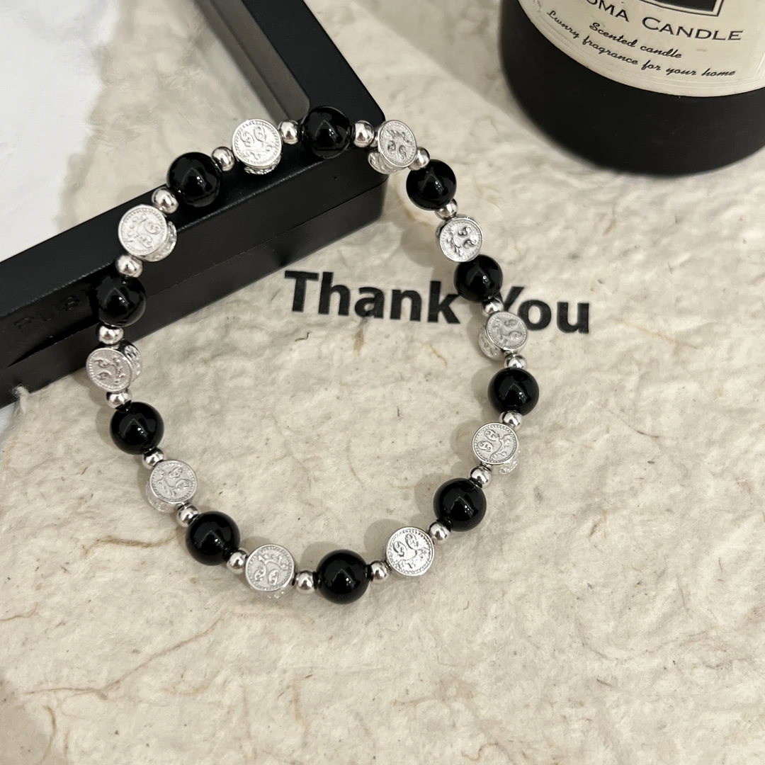 925银手链 小众设计轻奢风法式黑色珠珠笑脸圆饼拼接弹力绳手链