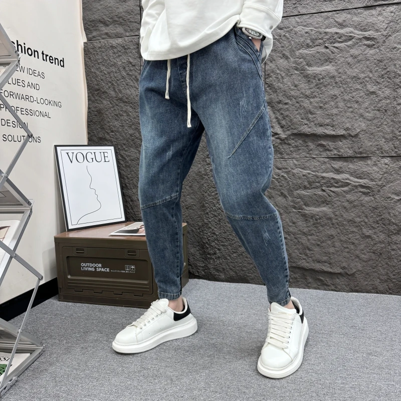 春秋新款修身牛仔裤弹力抽绳束脚哈伦裤男百搭蓝色痞帅九分小脚裤