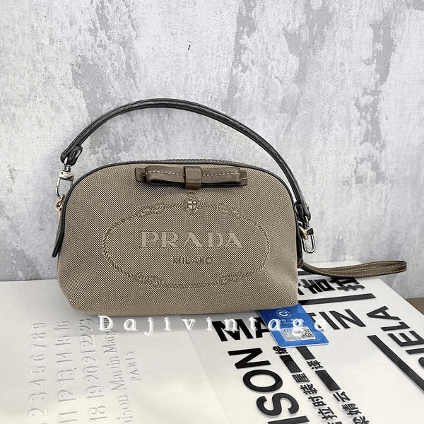 大吉中古/Prada普拉达帆布拼皮手拿化妆包