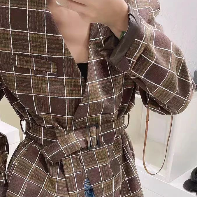 2025春季女生设计师款外套 DTNV233W182113