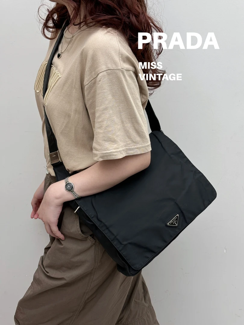 95新 Prada/普拉达 觅时/三角标斜挎包/113067