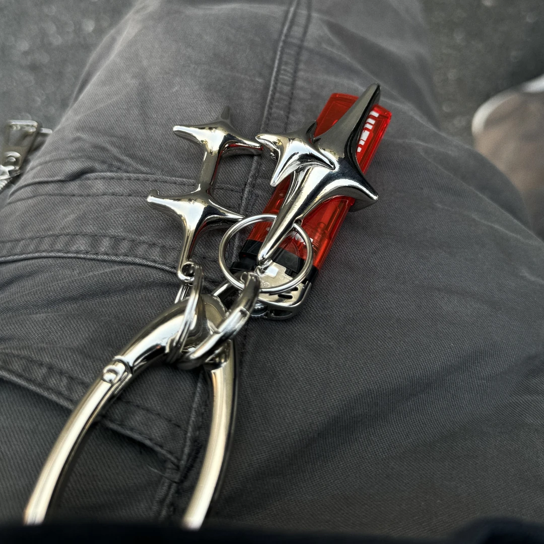 多功能创意科技造型金属星星椭圆钥匙扣打火机套壳高级感腰间配饰