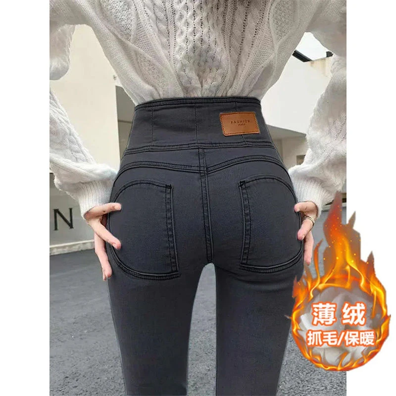 蜜桃臀高腰牛仔裤女2023冬季新款弹力显瘦紧身提臀小脚
