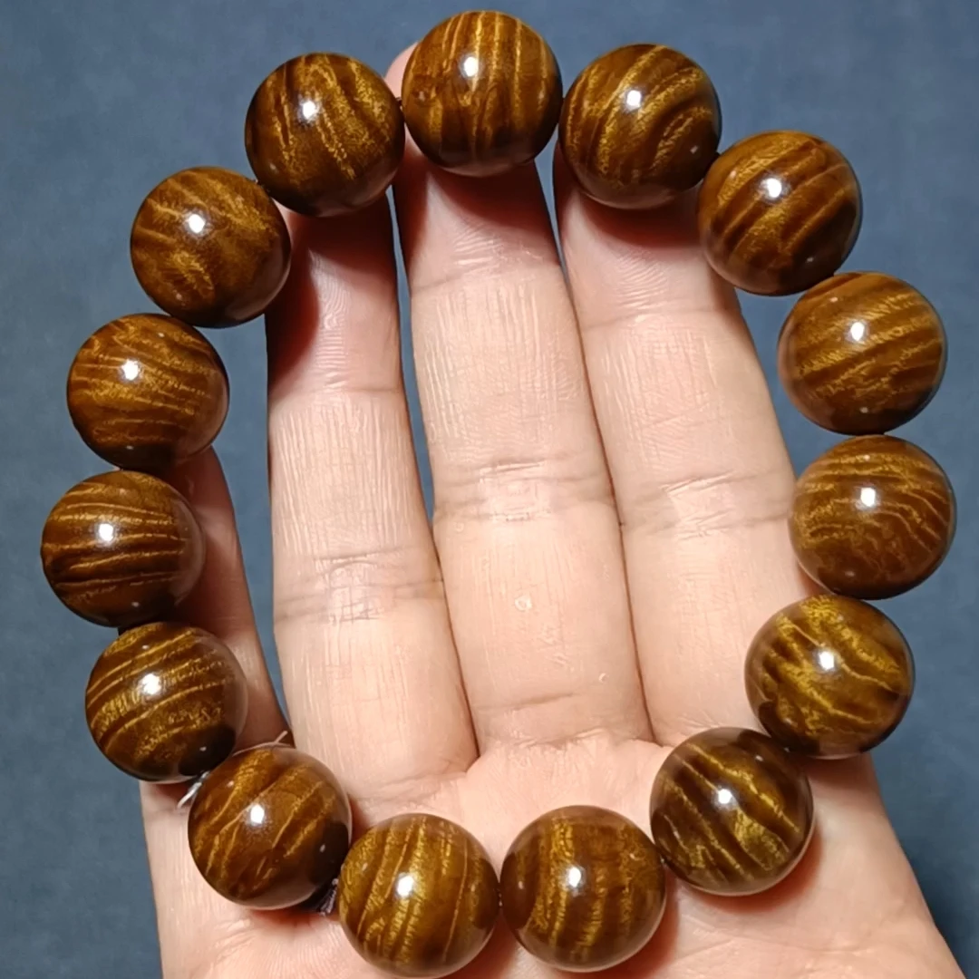 1.5闪电纹牛金丝楠木老料小叶桢楠手把玩