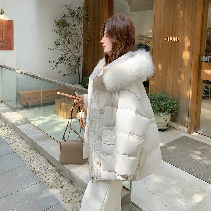 米白色韩版大真毛领连帽羽绒服女2024冬季新款保暖90白鸭绒面包服