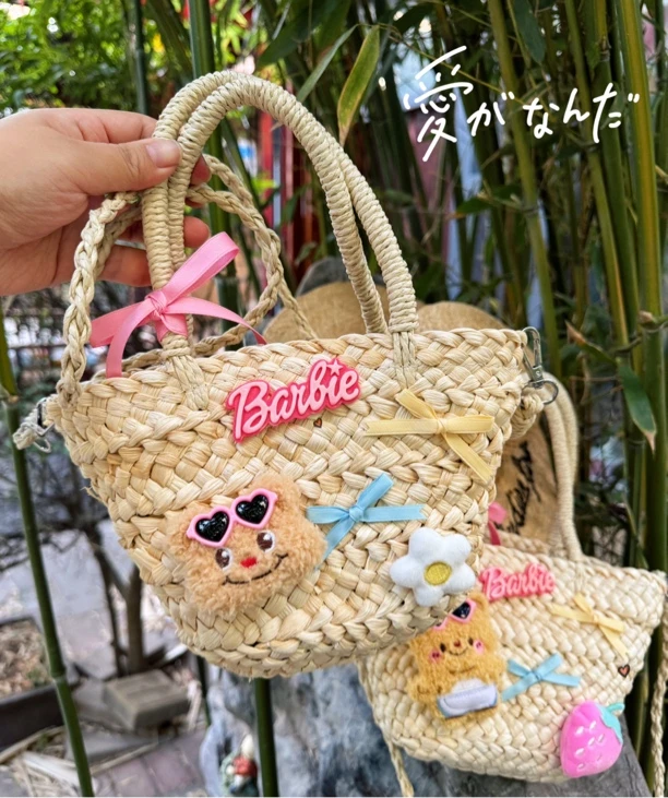 黄油小熊少女草编包2024新款手工编织菜篮子手提包度假风斜跨包女