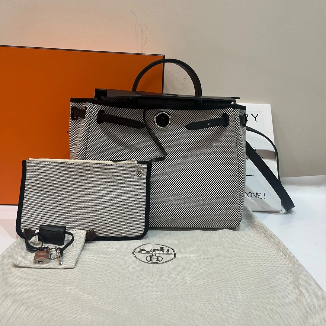 95新 Hermes/爱马仕 【蔡包紫】爱马仕herbag31U刻黑白拼色/6474002