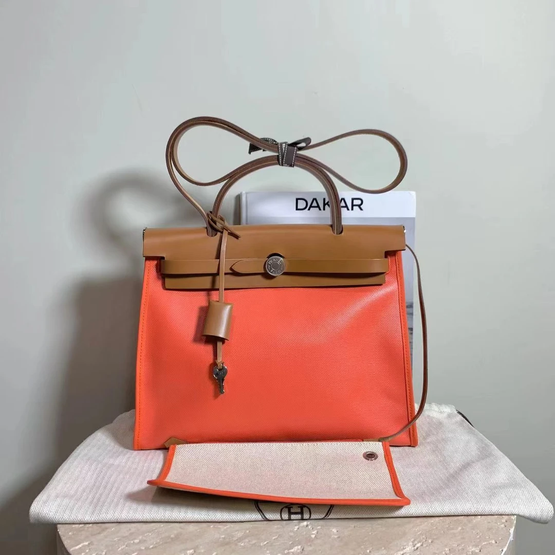99新 Hermes/爱马仕 尾款壹臻中古/橘银防水布herbag31 42291453