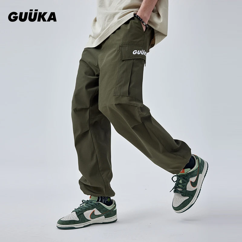 xl/guuka男女同款军绿色立体口袋工装裤春季收褶设计直筒X60163