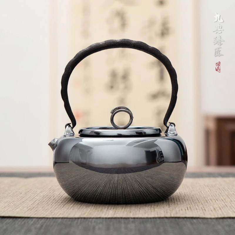 日式致真银壶足银999纯手工一张打煮茶壶泡茶壶镜面豆荚铁柄银壶
