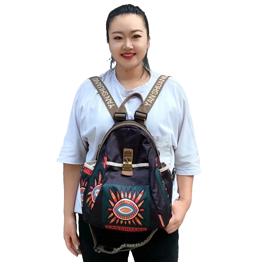 【阎双创造&黑底绿眼】高档轻便大容量百搭休闲布包双肩包