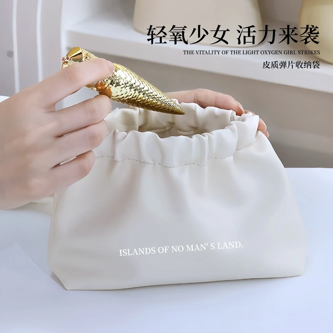 轻奢皮质化妆包小众口红收纳袋随身百搭零钱包包自动闭合弹片小包