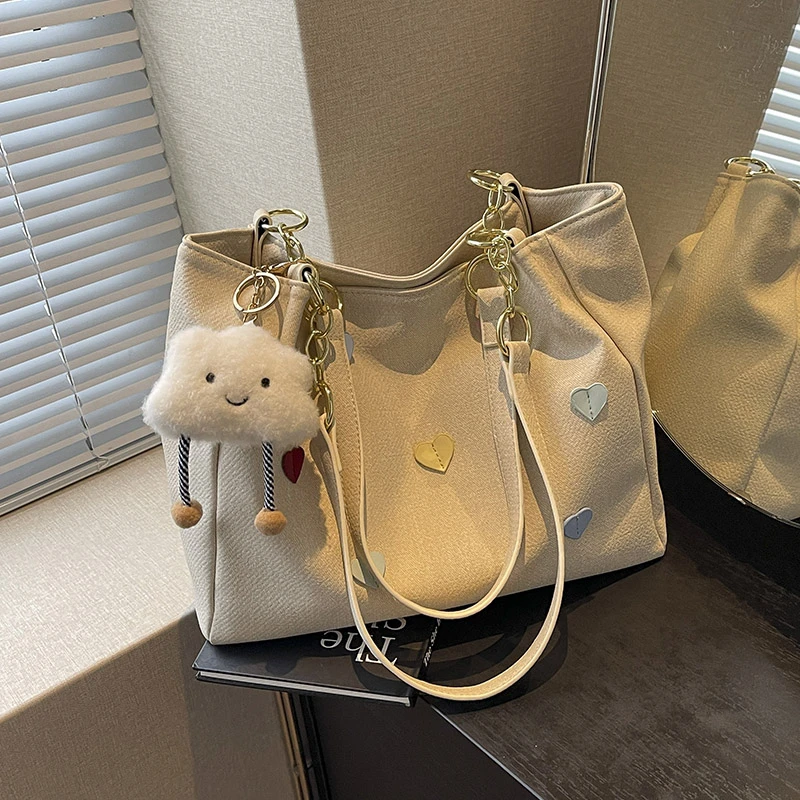 艾米兔女包2024新款韩版质感爱心设计洋气可爱挂件通勤单肩托特包