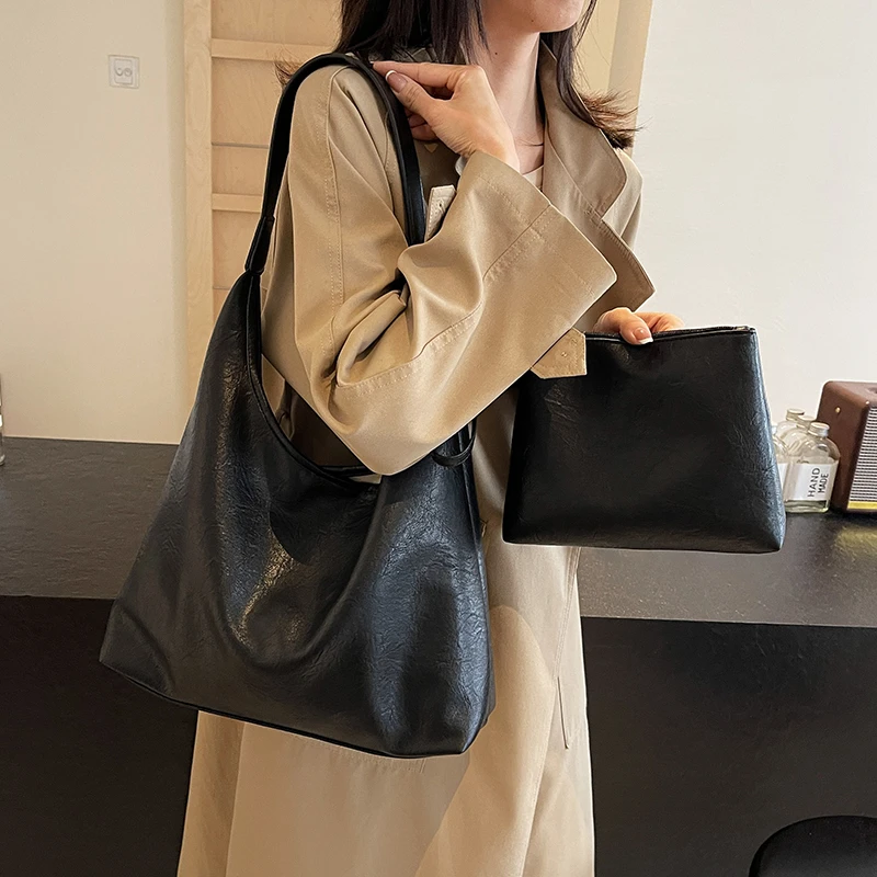 艾米兔女包2025新款百搭小众设计时尚纯色简约大容量手提托特包