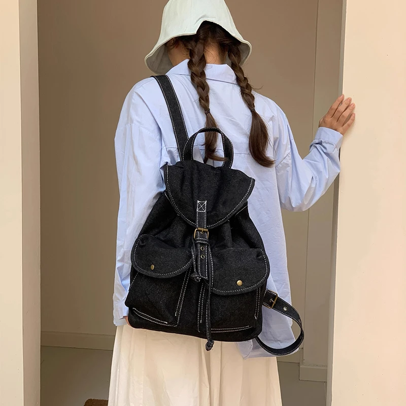 2025新款复古牛仔布旅行通勤双肩包简约轻便大容量小众大学生书包