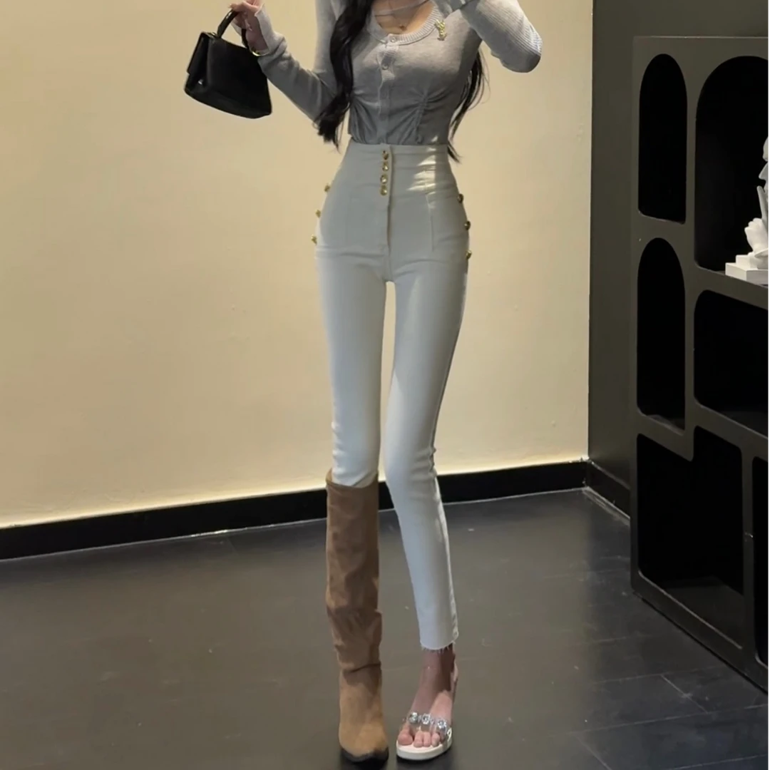 n010/h7加绒牛仔裤女修身毛边排扣小脚裤白色九分弹力铅笔裤女