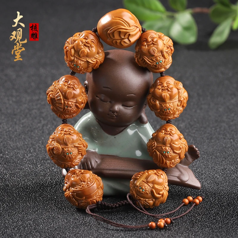 【九龙聚财】橄榄核纯手工雕刻文玩精品橄榄核八方来财核雕上色快