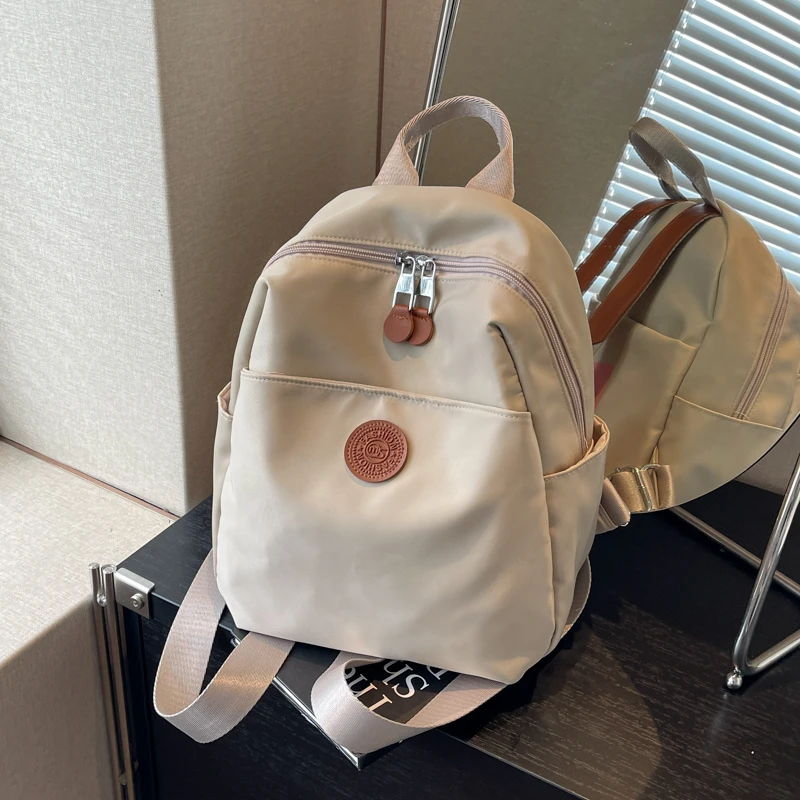 7613双肩包女2024新款春夏百搭女士包包防水书包便携旅行小背包