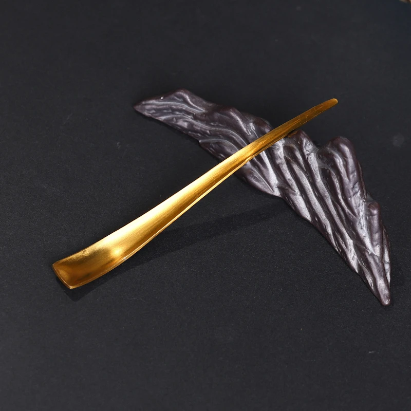 金色茶拨