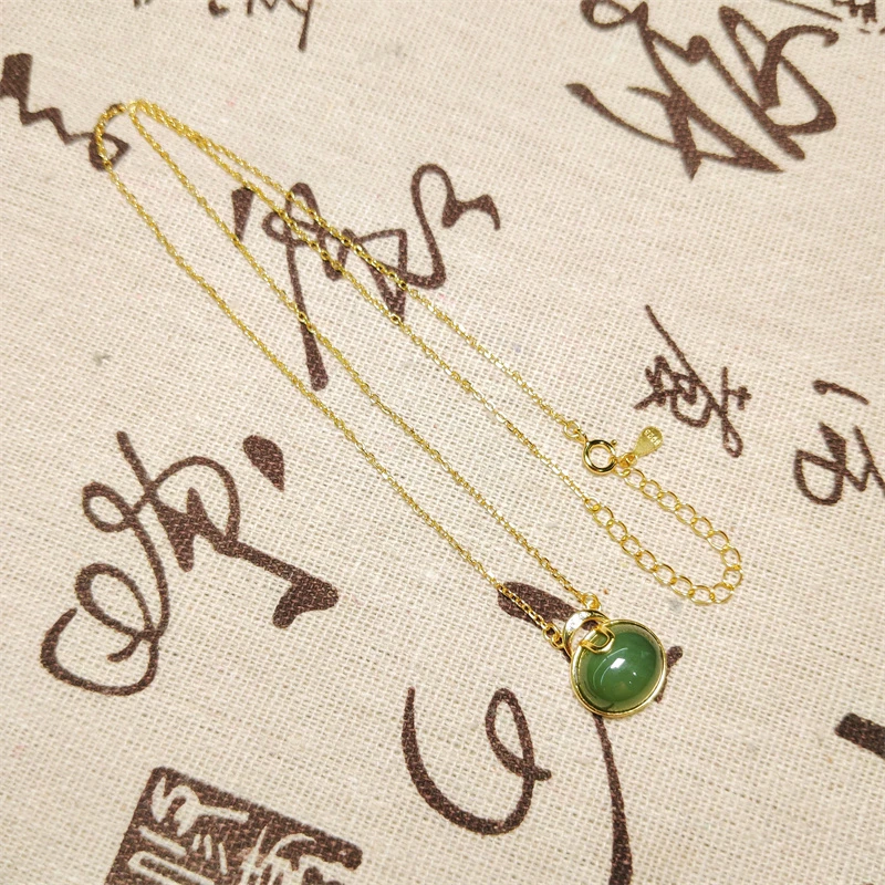 约10*12mm和田玉猫眼碧玉蛋形S925银镶项链