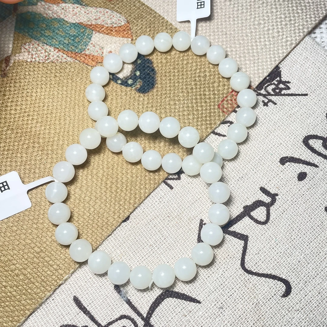 约8-9mm新疆米达料和田玉圆珠手串多样性发一