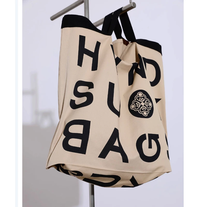 SUK【点睛单品】时髦帆布包SUK定制LOGO包 撞色字母手提包