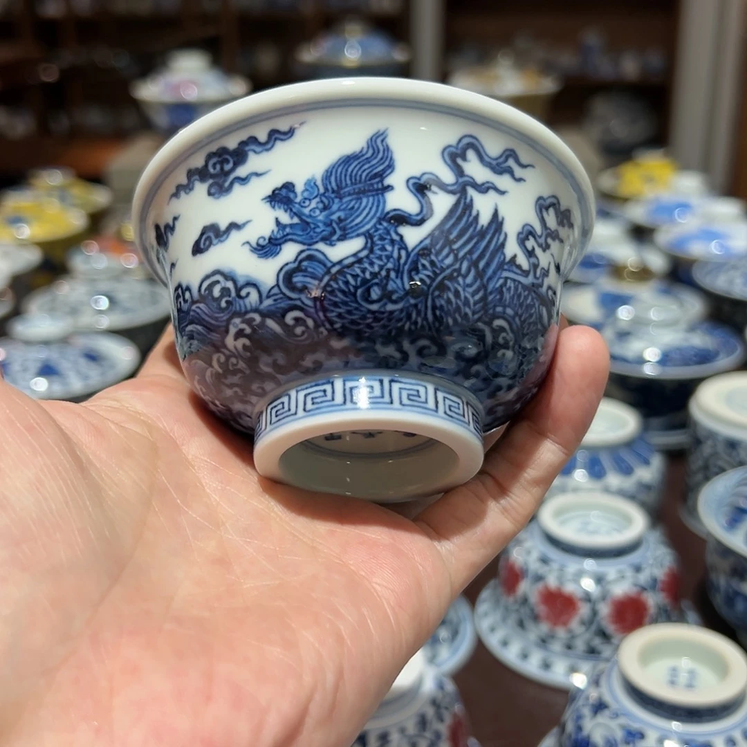 艺****籁真柴窑双龙压手杯