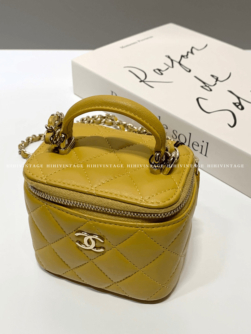 95新  HIHI/Chanel 黄色手柄小盒子包 新款镭射 /8570590