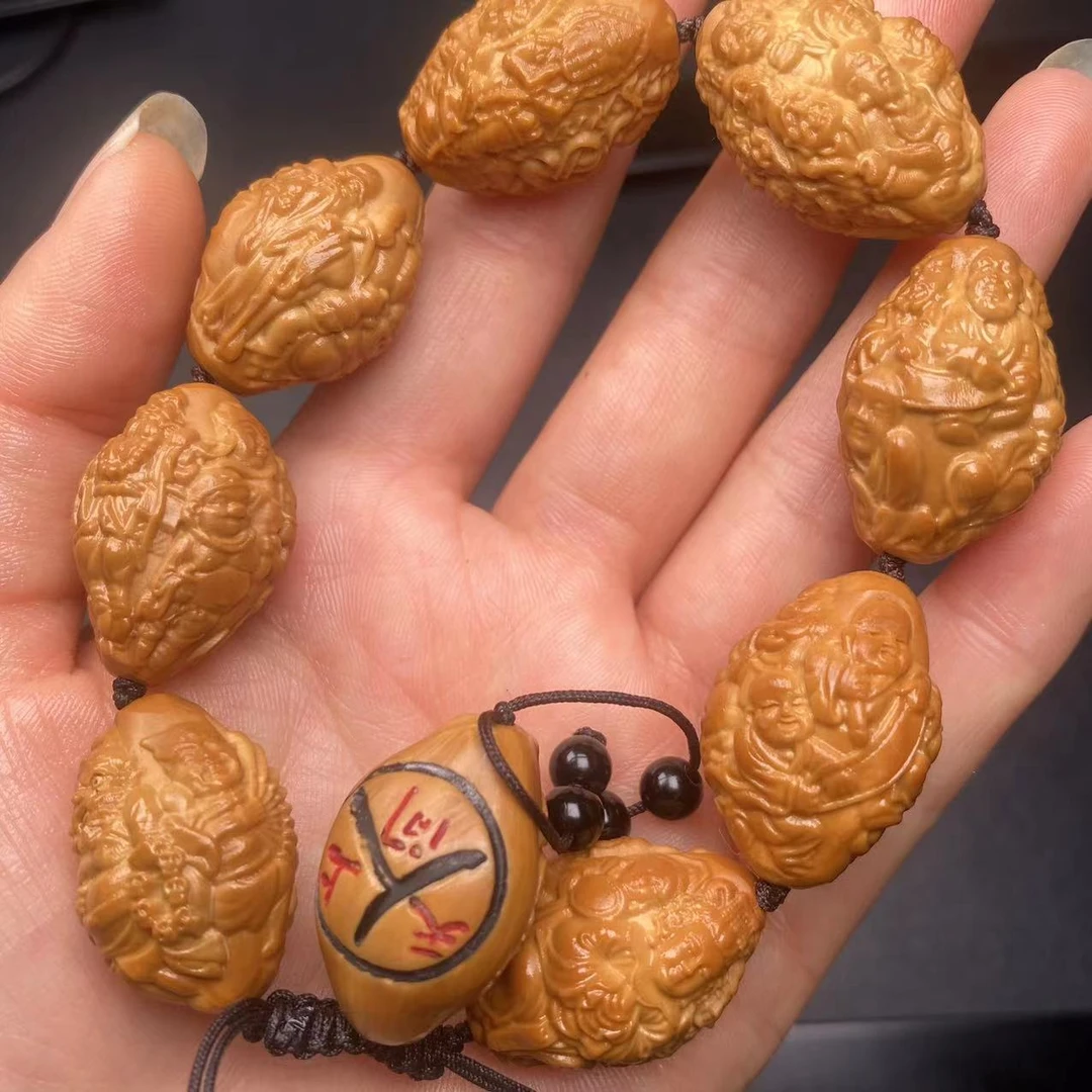 橄榄核核雕手串洋天上人间