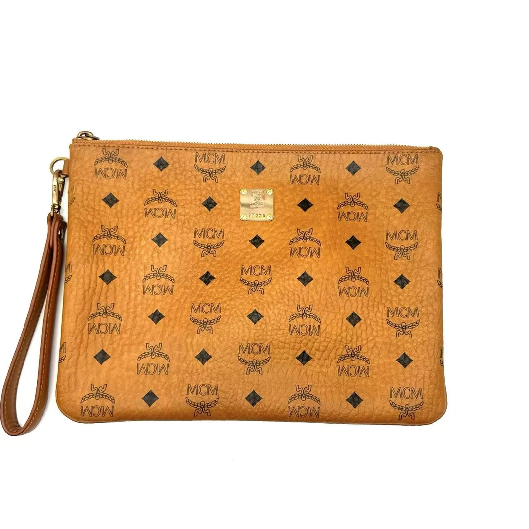 95新 MCM 丢丢专属/干邑色手拿/a1017017