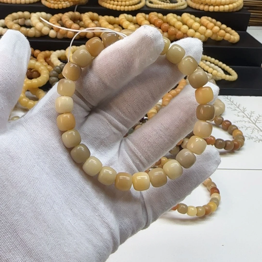 菩提根/象牙果手串8x9 5年精工花皮多包