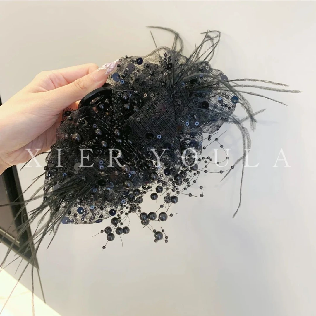 秋冬新款9-3-7轻奢气质蓬松羽毛满天星亮片抓夹