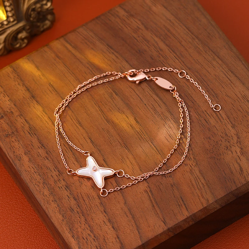 铜合金贝壳手链 电镀真金镶嵌白贝交叉手链轻奢气质时尚百搭精致