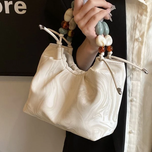 新中式国风包包女2024小众夏天洋气百搭斜挎包时尚超火手提水桶包