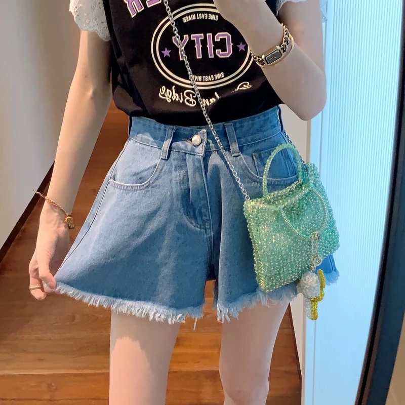 【张静芝】珍珠扣毛边A字显瘦牛仔短裤