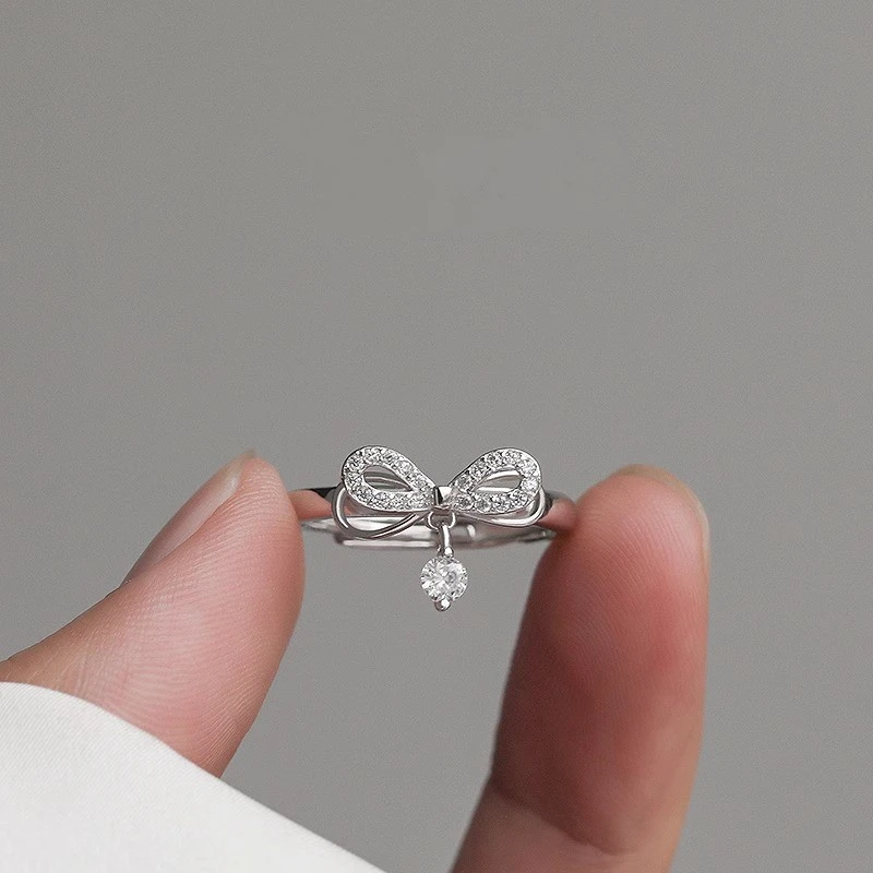 足银合成锆石戒指 纯银流苏蝴蝶结戒指食指戒小众设计感甜美指环