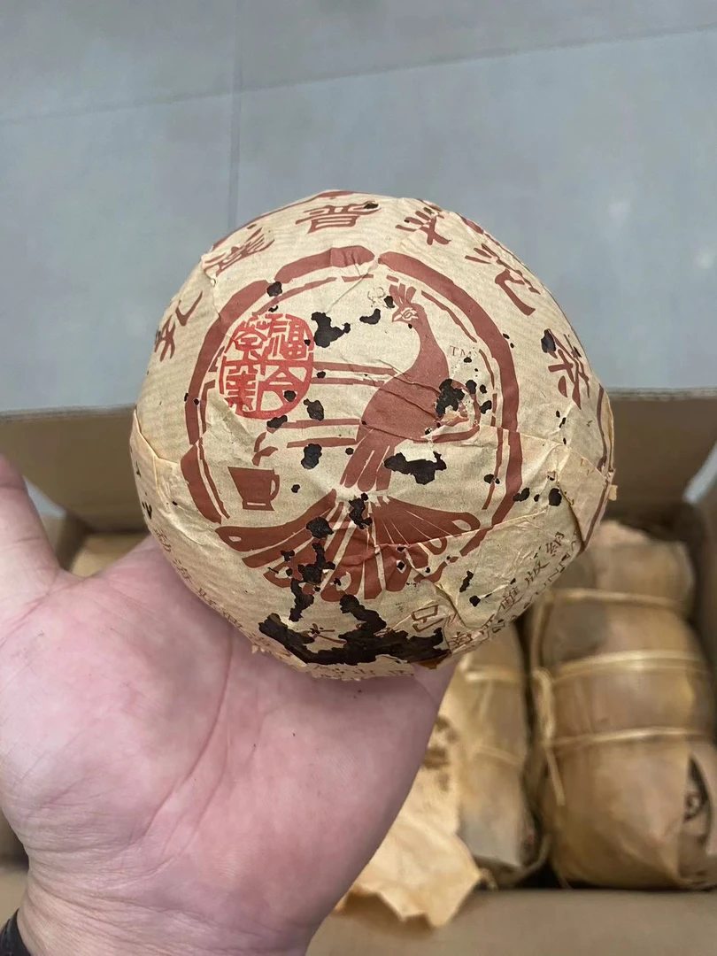 (1个)2005年大曼吕孔雀沱(熟茶)250克