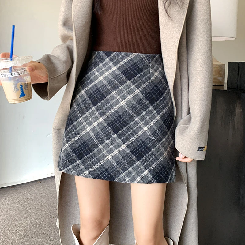 毛呢半身裙2024秋冬时尚高腰chic保暖斜格百搭包臀防走光A字裙