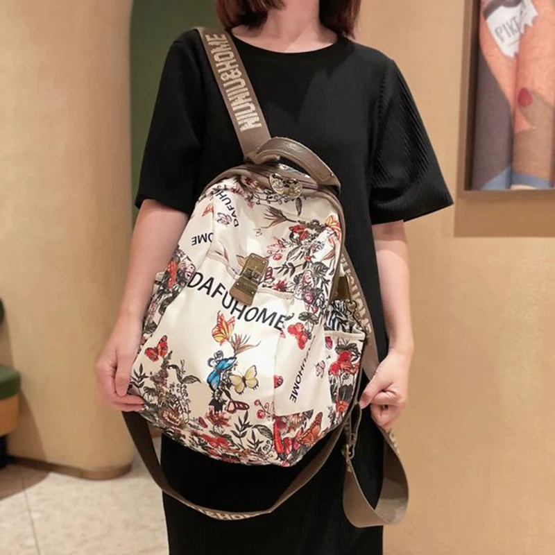 洋气蝶恋花南韩丝外出双肩包女2025新款时尚轻便女士背包旅行包包