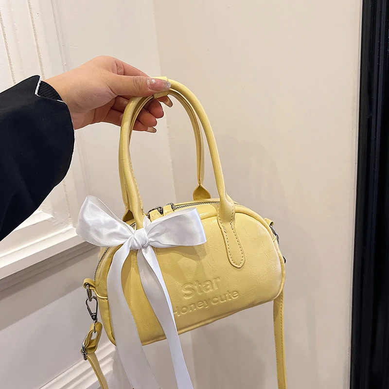 小众设计银色包包2024夏季新款蝴蝶结手提包洋气时髦保龄球单肩包